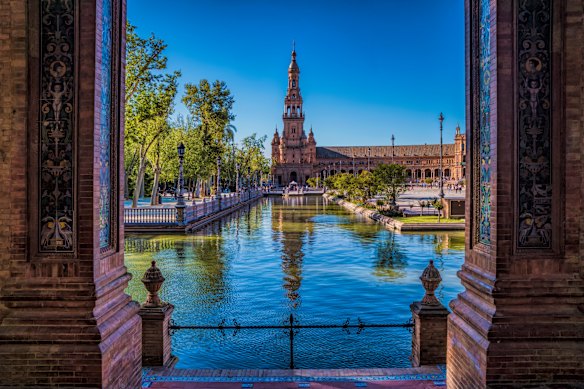 See Seville’s charming Plaza De Espana while it’s still free.