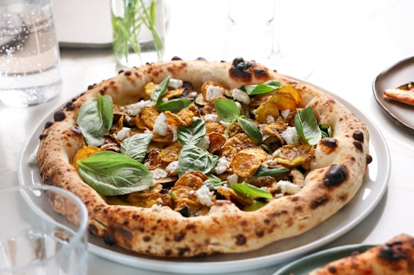 Charred zucchini with fior di latte, lemon cream, feta and zucchini chips.