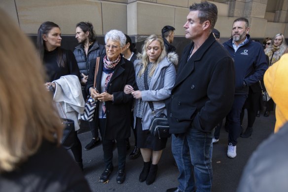 Lezsak’s family and friends outside court.