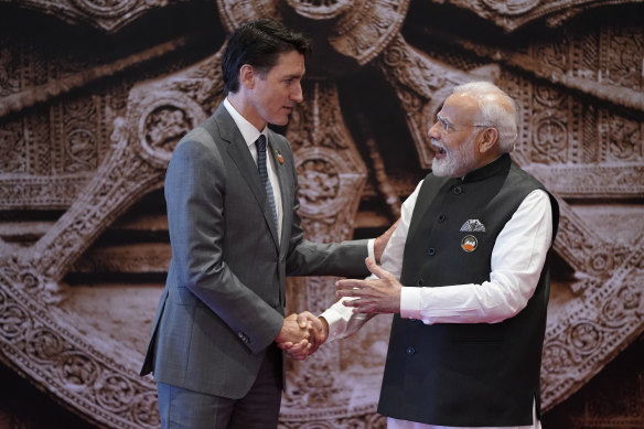 Narendra Modi welcomes Justin Trudeau upon his arrival at the G20 Summit in New Delhi on September 9.