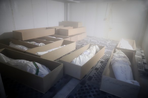 Coffins holding the bodies of mostly children sit in a room as they are prepared for the funerals of those killed in what Iranian officials said was an Israeli-US strike on February 28.