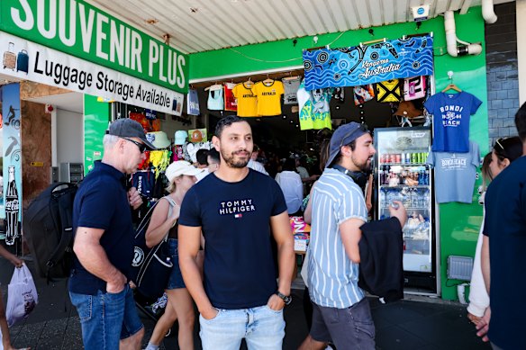 Ash Mehana, pictured outside his souvenir shop.