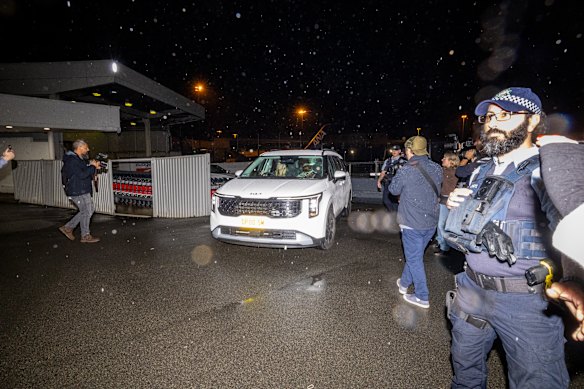 Islamic State-linked brides and their children leave Sydney International Airport on Tuesday.