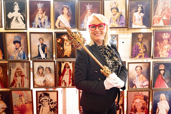 Former Melbourne lord mayor Sally Capp with a Moomba sceptre from the ’60s and portraits of Moomba monarchs.