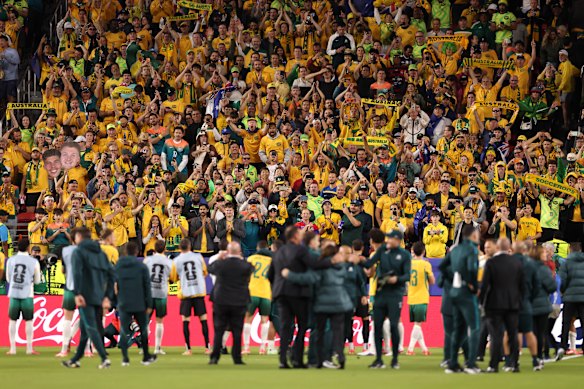 Fans in Santa Clara celebrate the Socceroos' qualification into the round of 32.