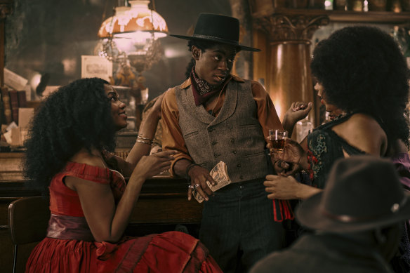 RJ Cyler (centre) plays Jim Beckwourth in <i>The Harder They Fall</i>.