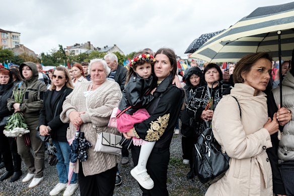 Residents of Lviv gather to mark Ukrainian Independence Day in the third year of war.
