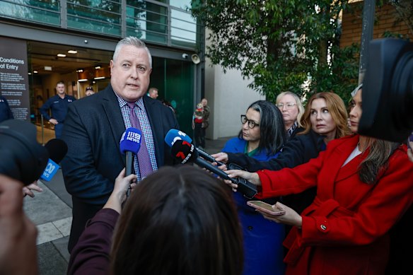 Inspector Dean Thomas speaks to the media on Monday.