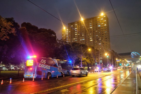 A police roadblock outside the Flemington public housing towers on Racecourse Road.