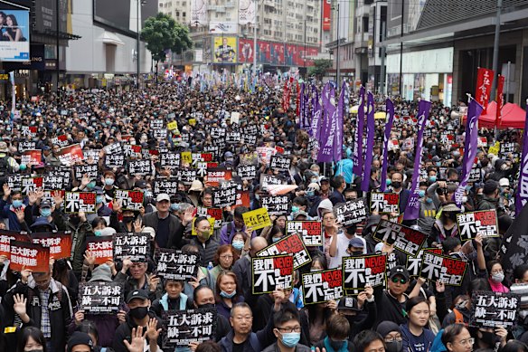 Tens of thousands of Hongkongers take to the streets in a 2020 New Year’s Day protest.