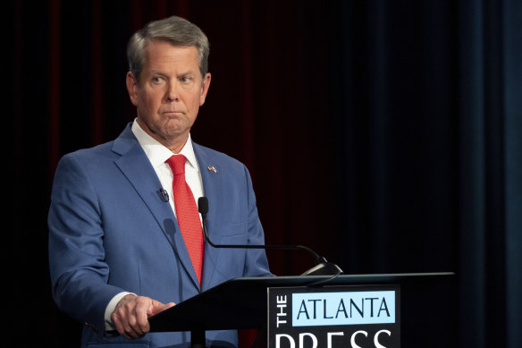 Republican Governor Brian Kemp looks on during the Atlanta Press Club debate. 