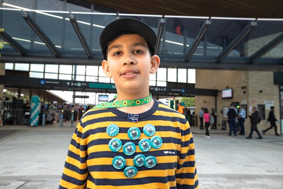 Train lover Sparsh Singla shows off his badge haul.
