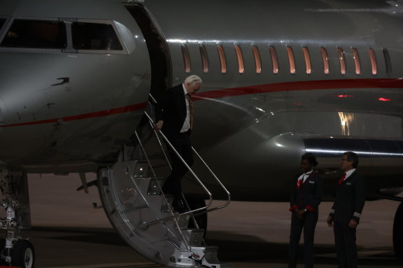 Julian Assange arrives at Canberra Airport on Wednesday evening.