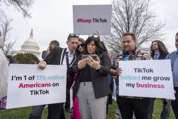 Devotees of TikTok protest the US bill outside the Capitol in Washington.
