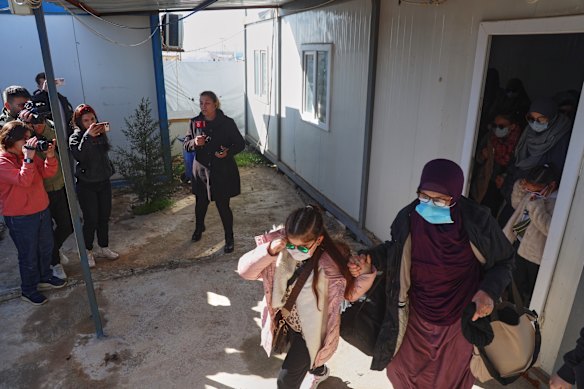 Australian family members of suspected Islamic State militants at the Al Roj Camp on Monday, walking towards a van that was bound for their flight home – before that attempted repatriation was abandoned.