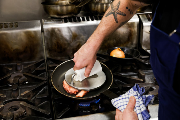 A weighted press is a formalised version of an old chef technique of stacking cast iron pans atop a frying protein to achieve a flat, even, crispy-skinned piece of meat