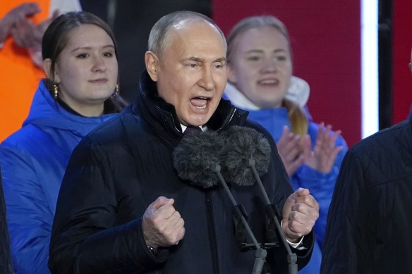 Russian President Vladimir Putin gestures during his speech in Red Square.
