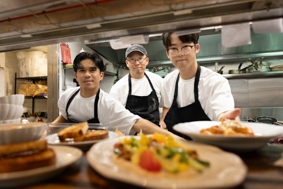 In the kitchen at Jinius (right: head chef Jerry Jeong).