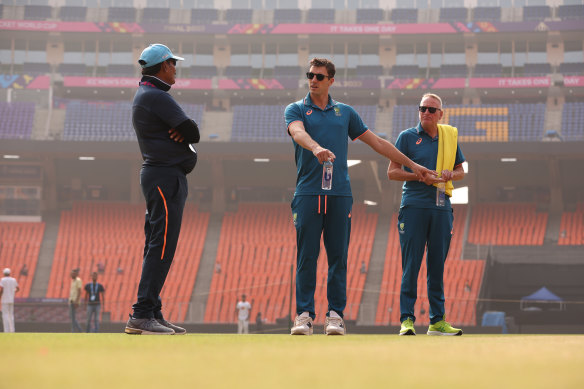 Pat Cummins points out his concerns with the pitch at Narendra Modi Stadium on Saturday.