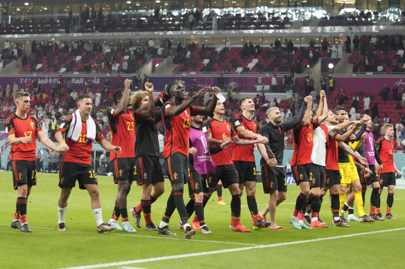 The Red Devils celebrate a 1-0 win over Canada.