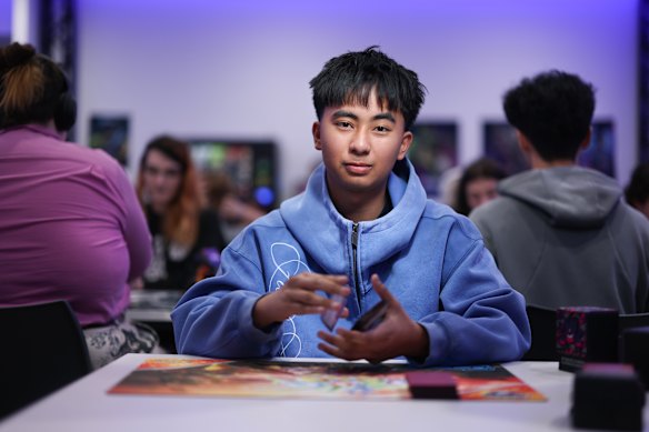 Jacob Sulte, pictured at General Games Highpoint, has been playing Pokemon trading card games competitively for the past few years.