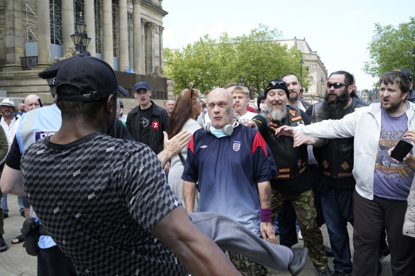 A group referring to themselves as "patriots" clash with anti-racism protesters at the Cenotaph during a Black Lives Matter protest on June 13, 2020 in Bolton, England. 