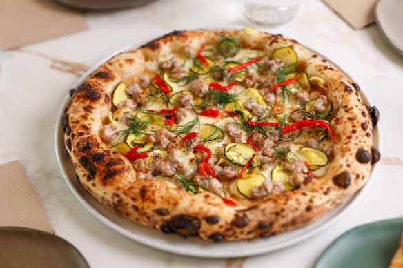 Pork and fennel sausage with fior di latte, zuni pickle and confit garlic.