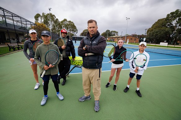 Junior players Sarah Mildren, Ethan Liversage, Sadie Gillard and Max Winstanley with coaches Todd Ley and Todd Langman (middle) at Glenlea Tennis Club.