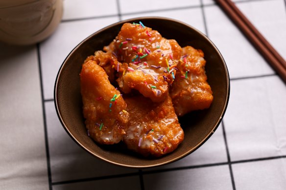 Sweet, soft, chewy rice cakes with sprinkles and a house-made condensed milk sauce. 
