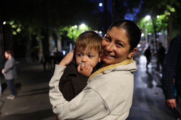 Stacey Nicholson with son two-year old son Bodhi woke early to attend the service at Martin Place.