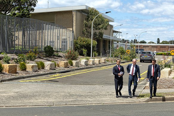 Corrections Minister Anoulack Chanthivong, Planning Minister Paul Scully and Maroubra MP Michael Daley outside Long Bay jail on Wednesday.