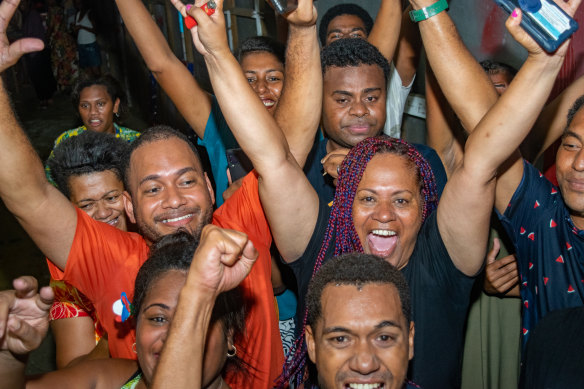 People’s Alliance supporters celebrate Sitiveni Rabuka’s return to the top job in Suva, Fiji.