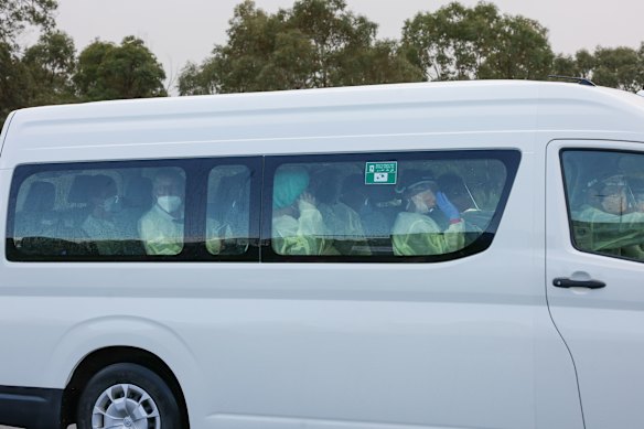The passengers arrive at the Bullsbrook Centre for National Resilience on Friday morning.