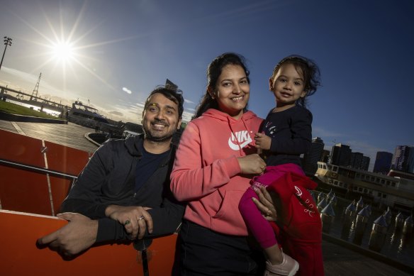 Neeraj Kumar, Aparna Thakur and their daughter Manasvi Bharadwaj have called Docklands home for six months.