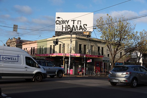 A prominent billboard in Fitzroy has been vandalised with a pro-Hamas message on the anniversary of the October 7 attacks.