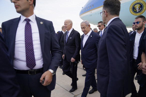 President Joe Biden is greeted by Israeli Prime Minister Benjamin Netanyahu after arriving at Ben Gurion International Airport, in Tel Aviv. 
