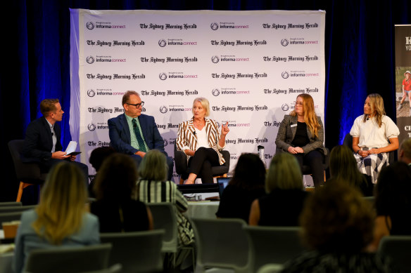 Professor Jenny Gore (centre) and Sarah Warby (second from right) at the SMH Schools Summit. 