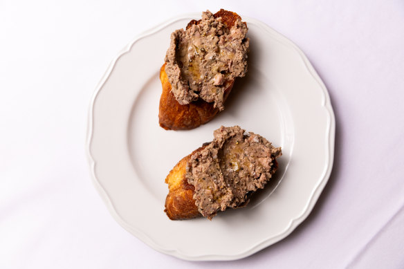 Chopped liver crostini with chicken schmaltz: a few rich bites on bread fried in chicken fat.