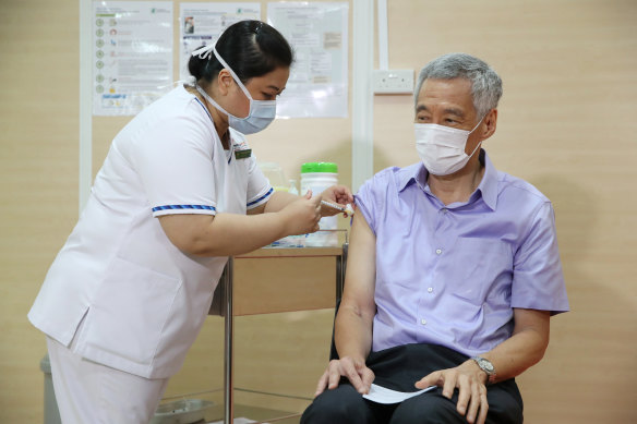 Singaporean Prime Minister Lee Hsien Loong receiving his coronavirus vaccine earlier this year. 