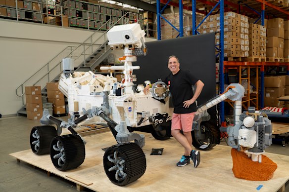 McNaught with a model of the Perseverance Rover, part of the science exhibition in Bendigo.