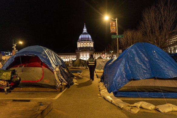 San Francisco’s homeless rest in the shadows of City Hall.