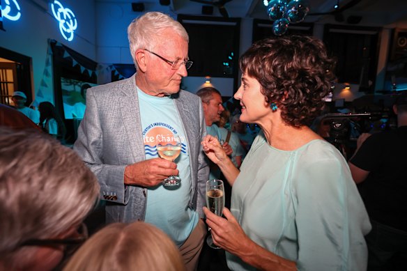 Michael Chaney with daughter Kate Chaney MP, the independent Member for Curtin with supporters at UWA Tavern after the Federal Election.
