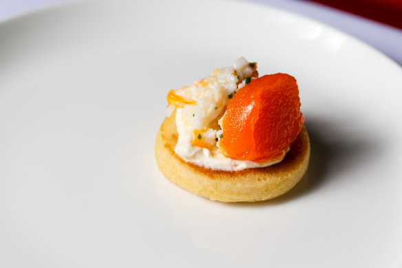 Potted crab on a pikelet with whipped butter. 