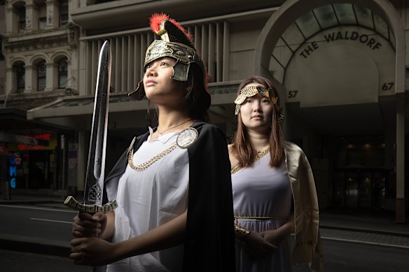 Sydney Party Decorations staff members model The Odyssey-inspired costumes.