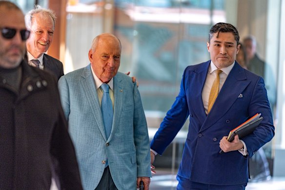Alan Jones arrives at the Downing Centre Local Court on Wednesday.