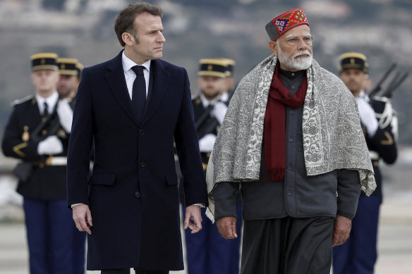French President Emmanuel Macron, left, and Indian Prime Minister Narendra Modi at Marseille Provence airport in France on Wednesday.