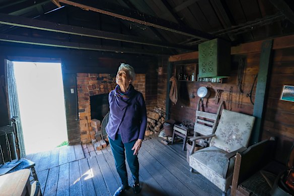 Toomey inside a well-preserved hut. 