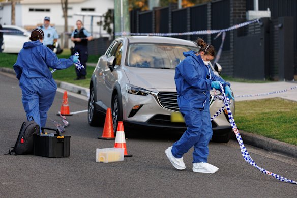 Officers at the scene of a deadly shooting in Sydney’s west.