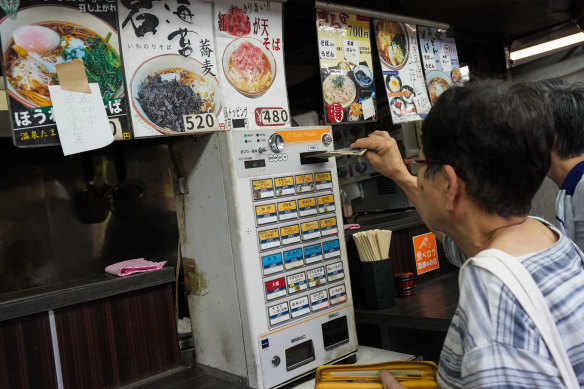 The ticket vending machine at Kakinuma’s udon and soba noodle canteen in Tokyo’s Asakusa district   does not accept Japan’s new 3D hologram bank notes.