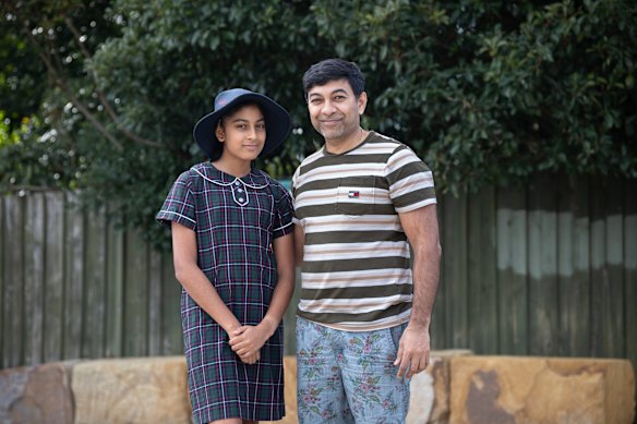 Akshaya Valluri, 11, with her father Rajesh Valluri.